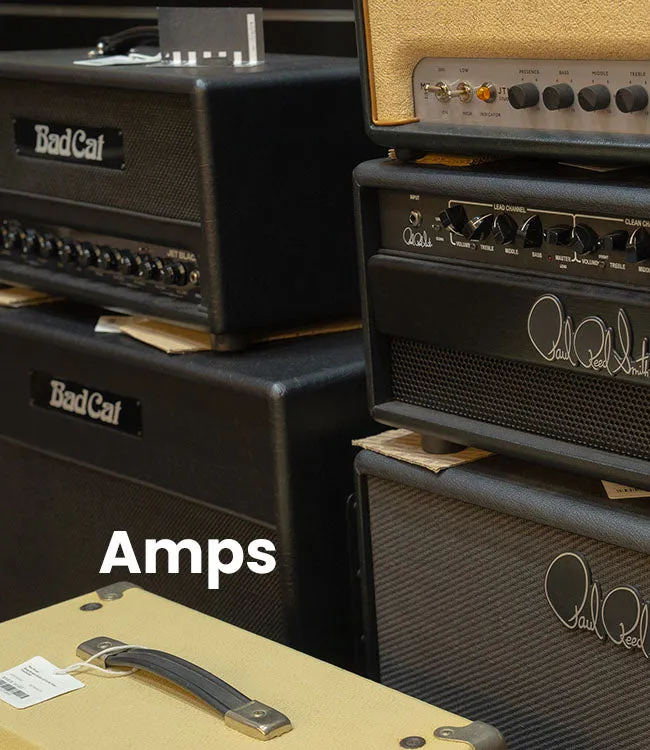 Premium guitar amplifiers stacked in a showroom